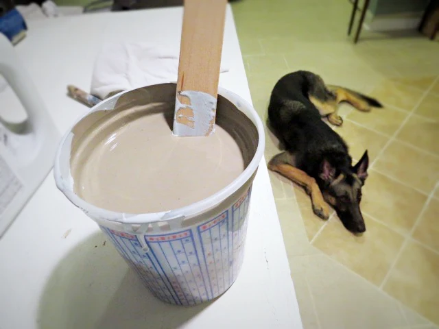 Finn overseeing mixing of custom color with leftover paint