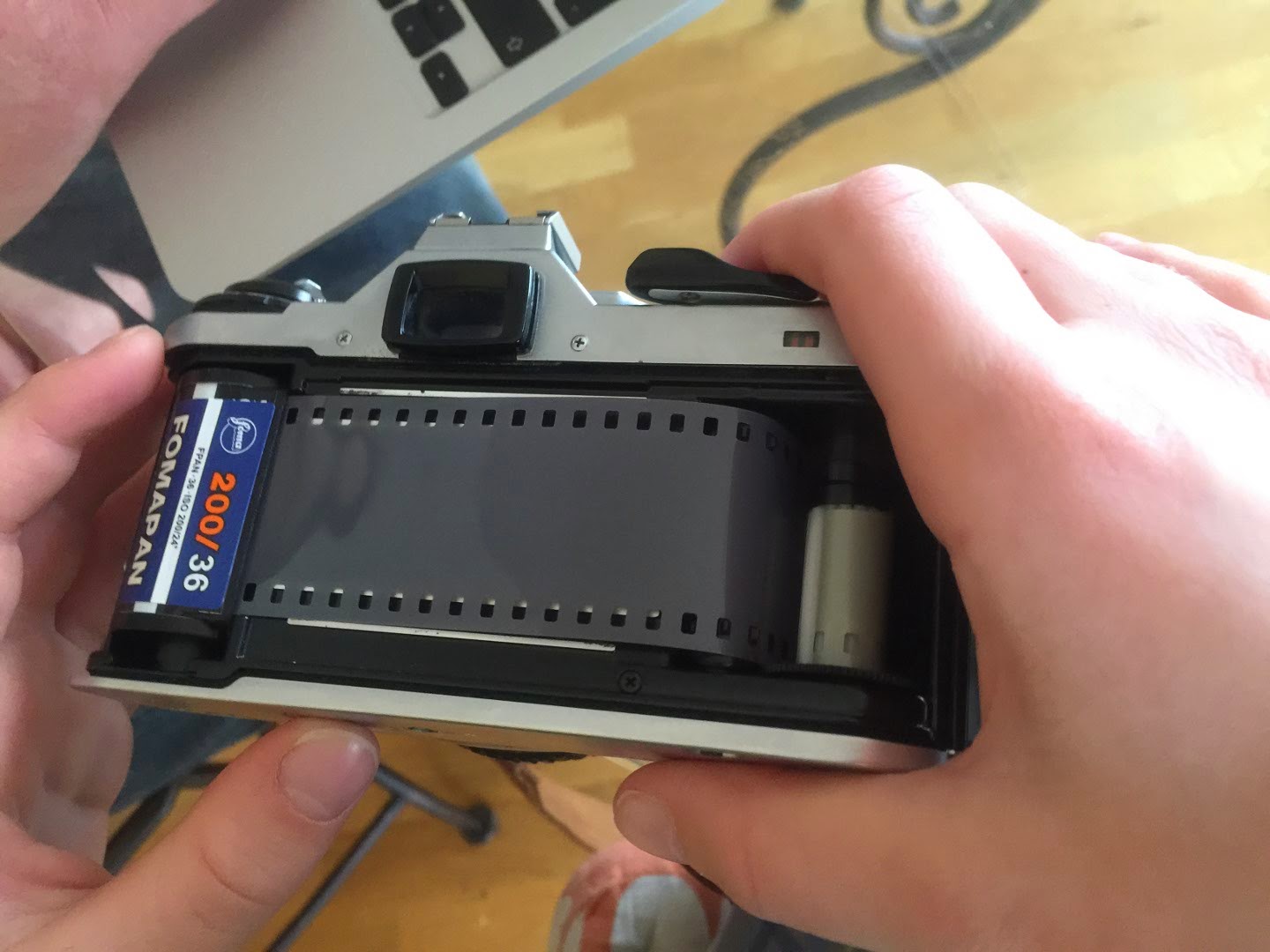 Photography Loading film into the Pentax ME super 35mm film camera