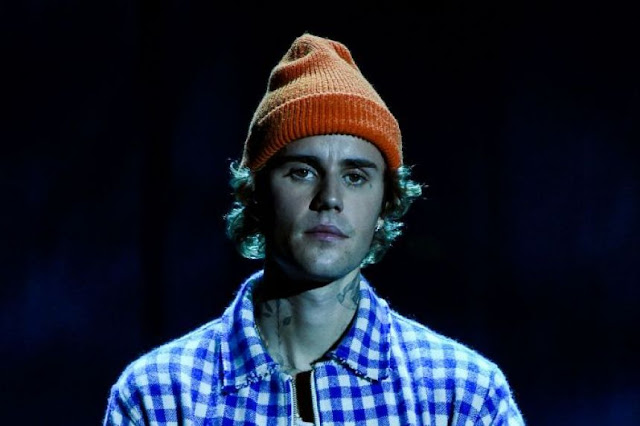 "Singer Justin Bieber teams up with former rivals for Christmas song"