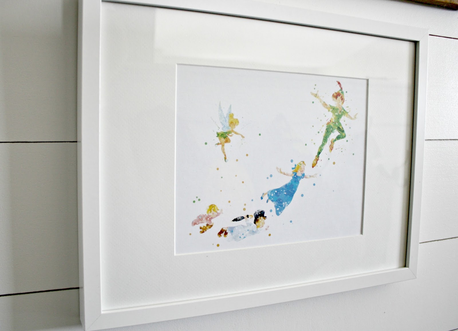 Our fun Disney art wall from Thrifty Decor Chick