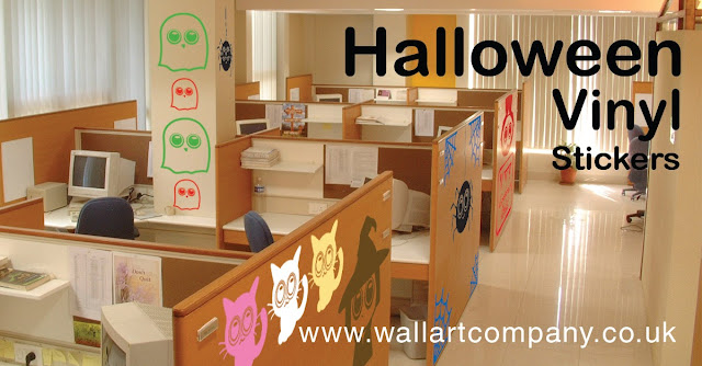 Halloween themed decortions for office party with vinyls of cats, witches, vampires, spiders and their webs from wallartcompany.com