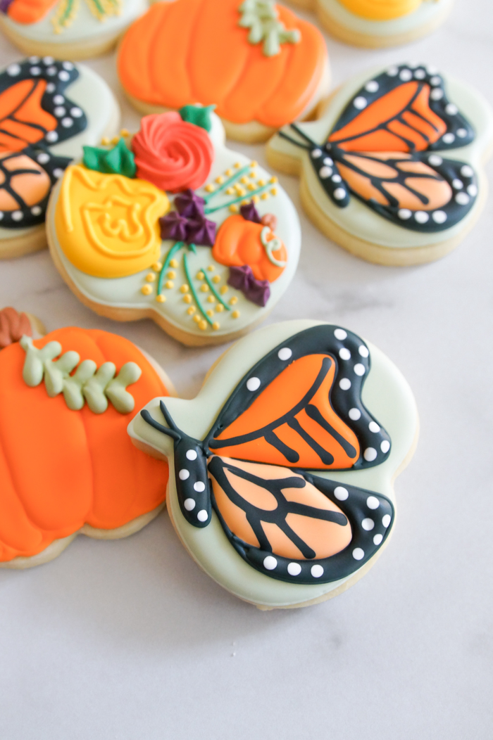 pumpkin, butterfly, and floral cookies for fall...made from ONE cookie cutter!