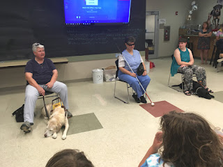 Audrey, Laurel and Kimberly presenting for day campers at BARK Camp