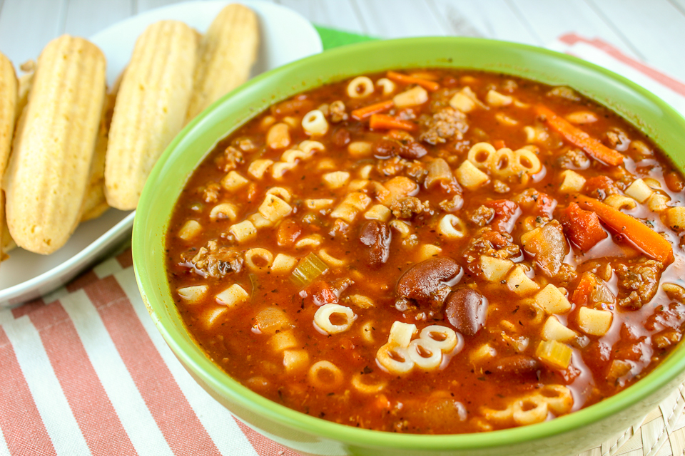 This Olive Garden Pasta Fagioli recipe will have you feeling like you just walked into the garden of olives! It's like an Italian version of chili with sausage, carrots, onion, celery, tomatoes, beans and so much more! It's a perfect copycat recipe and tastes exactly like the real thing. It's my favorite soup to make!