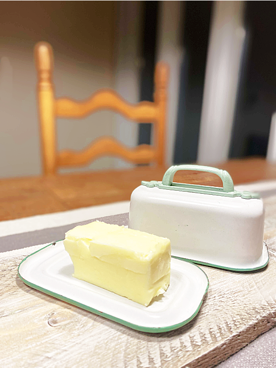 enamelware container turned butter dish with butter