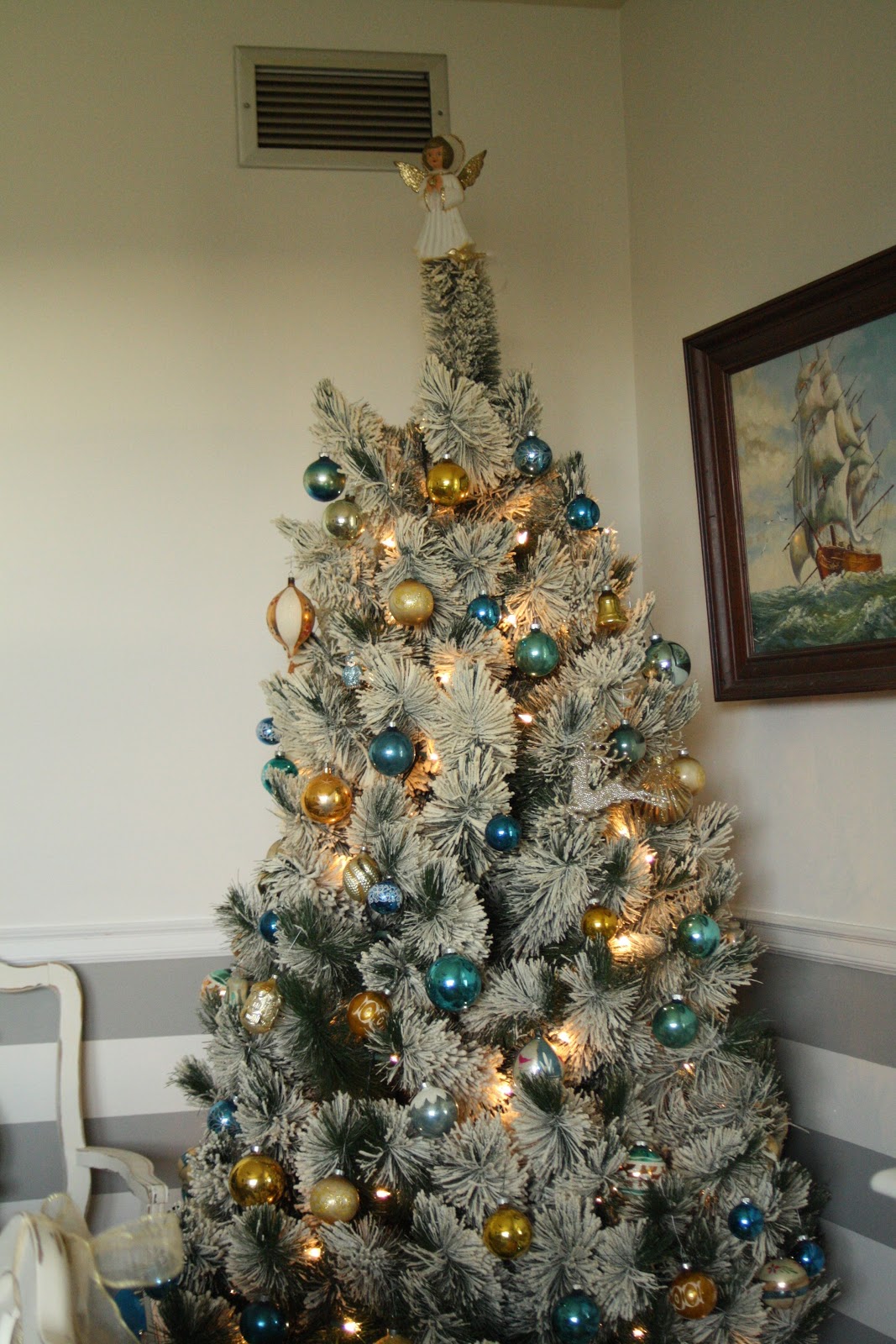 My Silver, White, and Gold Feather Adorned Tree - Cassie Bustamante