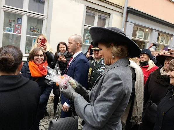 Queen Maxima wore  Natan coat and dress, Christian Louboutin grey suede toe pumps, Chanel Grey caviar leather coco bags