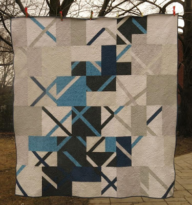 Chassés-croisés quilt made by Francine Béliveau and inspired by Luna Lovequilts Vinyle wall hanging