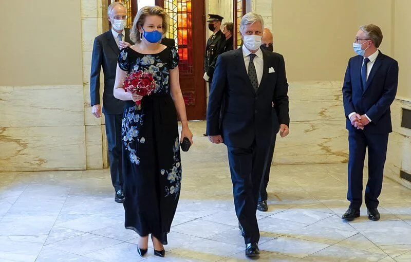 Queen Mathilde wore a floral embroidered black dress drom Dries Van Noten. Emporio Armani floral-embroidered dress