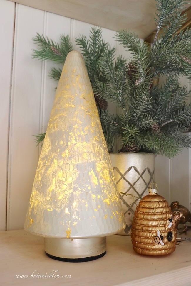 Price tags on lighted mercury trees, etched mercury vases, and beehive Christmas ornaments will help shoppers at the French Country Christmas Event