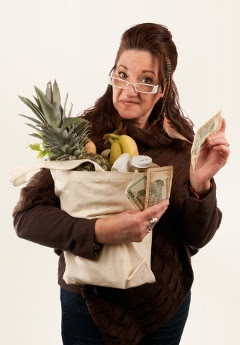 Women with groceries and money
