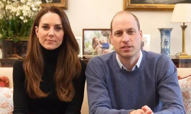 Kate Middleton, Duchess of Cambridge wore a black turtleneck and gold hoop earrings. Time to Change campaign with mental health