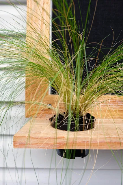 garage window cedar floating shelf planter