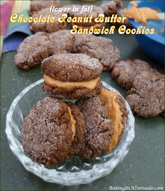 Chocolate Peanut Butter Sandwich Cookies are quick and easy (they start with a mix) and lower in fat but high in chocolatey flavor. | Recipe developed by www.BakingInATornado.com | #recipe #cookies