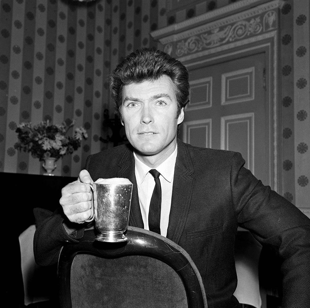 Clint Eastwood Samples a Pint of Beer During His Visit to Manchester in