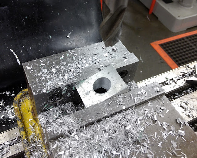 opening 7/8" angled hole in aluminum block
