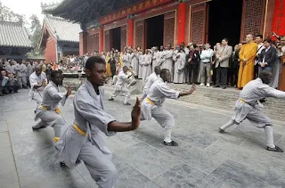 Monks from Africa attend a Buddhist ceremony held at Shaolin Temple in Zhengzhou