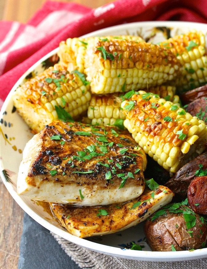 This Halibut with Red Potatoes, Corn, and Sausage Sheet Pan Dinner is an amazing feast.