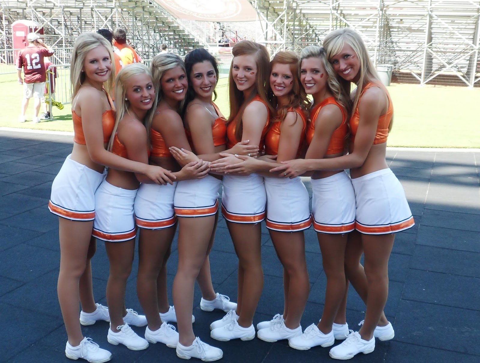 Nfl And College Cheerleaders Photos Oklahoma State Cheerleaders Make Orange Sexy