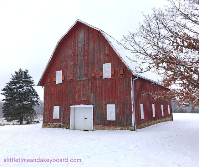 Charming scene of a barn in winter at LeRoy Oakes Forest Preserve in St. Charles, Illinois.