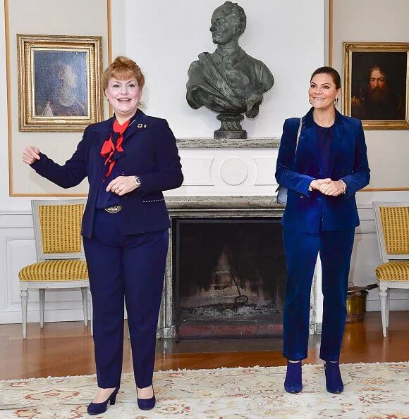 Princess Victoria wore a cord suit by Dagmar, and blue boots by af Klingberg, and pyramid earrings by Sophie by Sophie