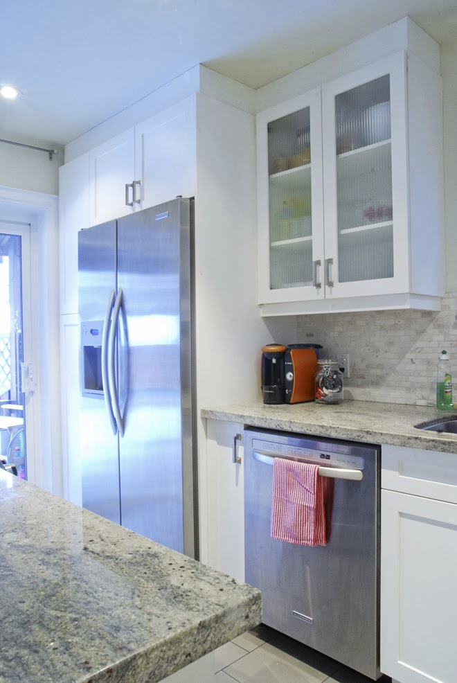 Rambling Renovators | white kitchen shaker cabinet ribbed glass
