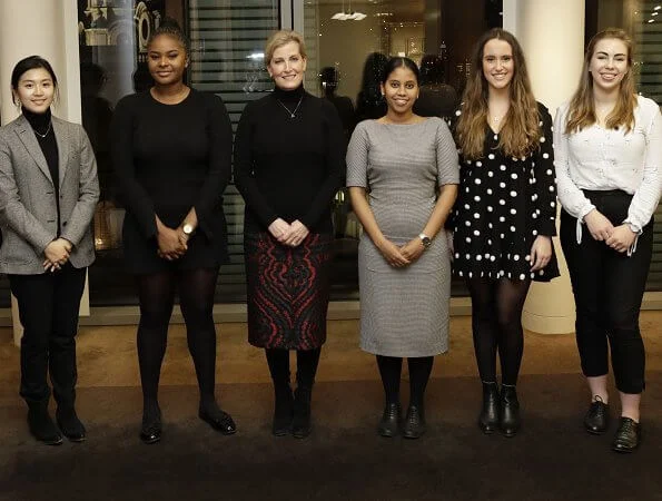 The Countess is Chair of the DoFE (The Duke of Edinburgh’s Award) Women’s Network Forum. flared print knit midi skirt black red