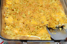 Taco Pie recipe covered in cheese from Served Up With Love