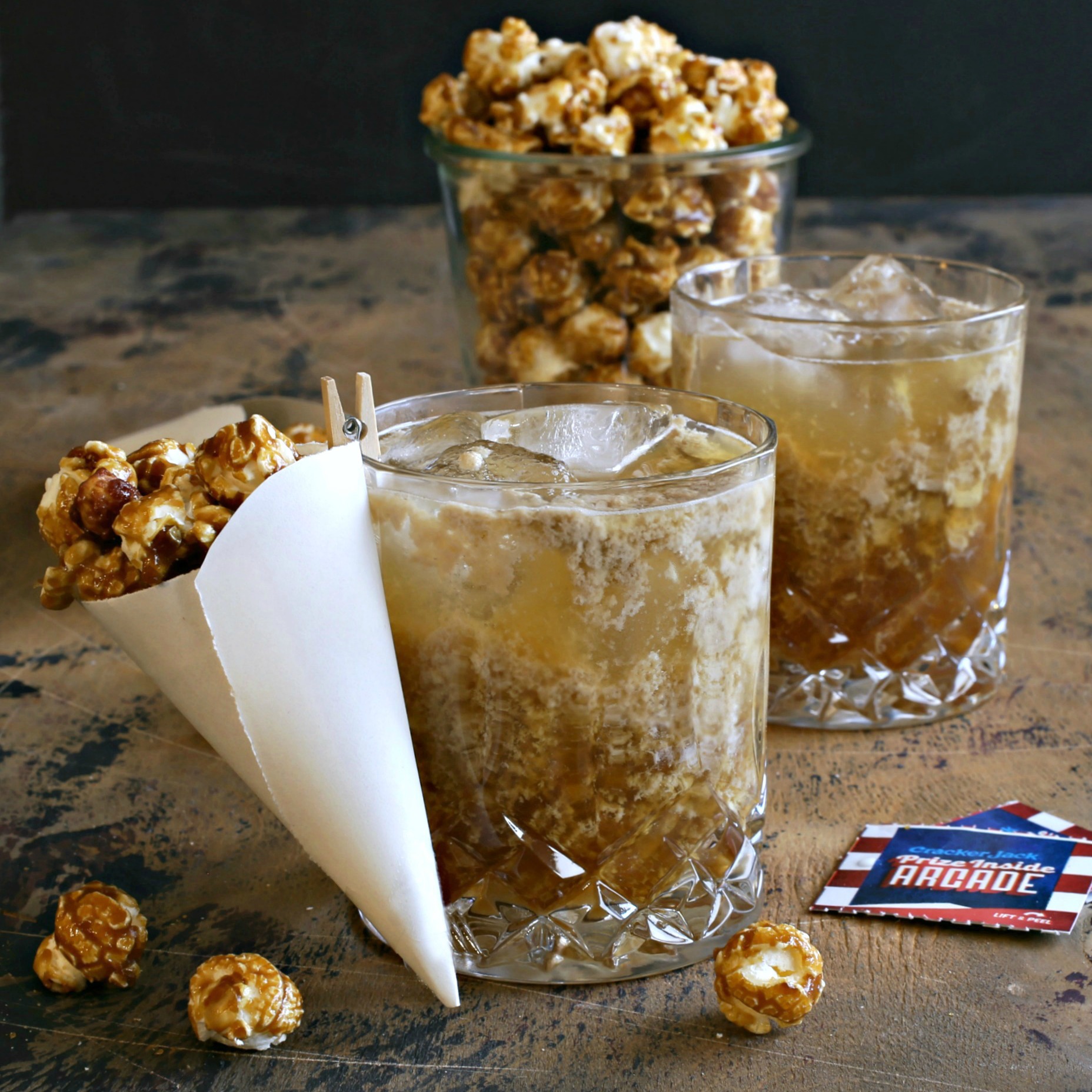 Recipe for a cocktail with butterscotch liqueur, milk and Cracker Jack infused bourbon.