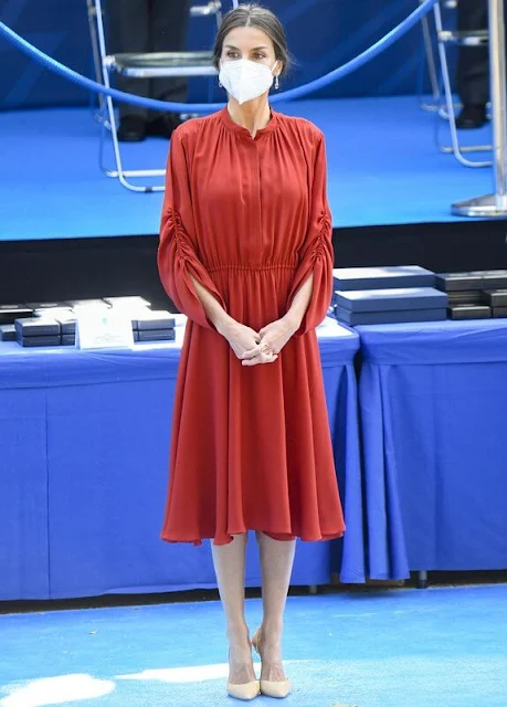 Queen Letizia of Spain wore a red long sleeve flared midi dress by Salvatore Ferragamo