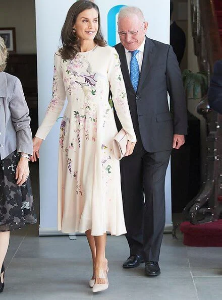 Queen Letizia wore a floral bird embroidery midi dress by Asos Design, and the Queen jewels Coolook Sarin diamond earrings