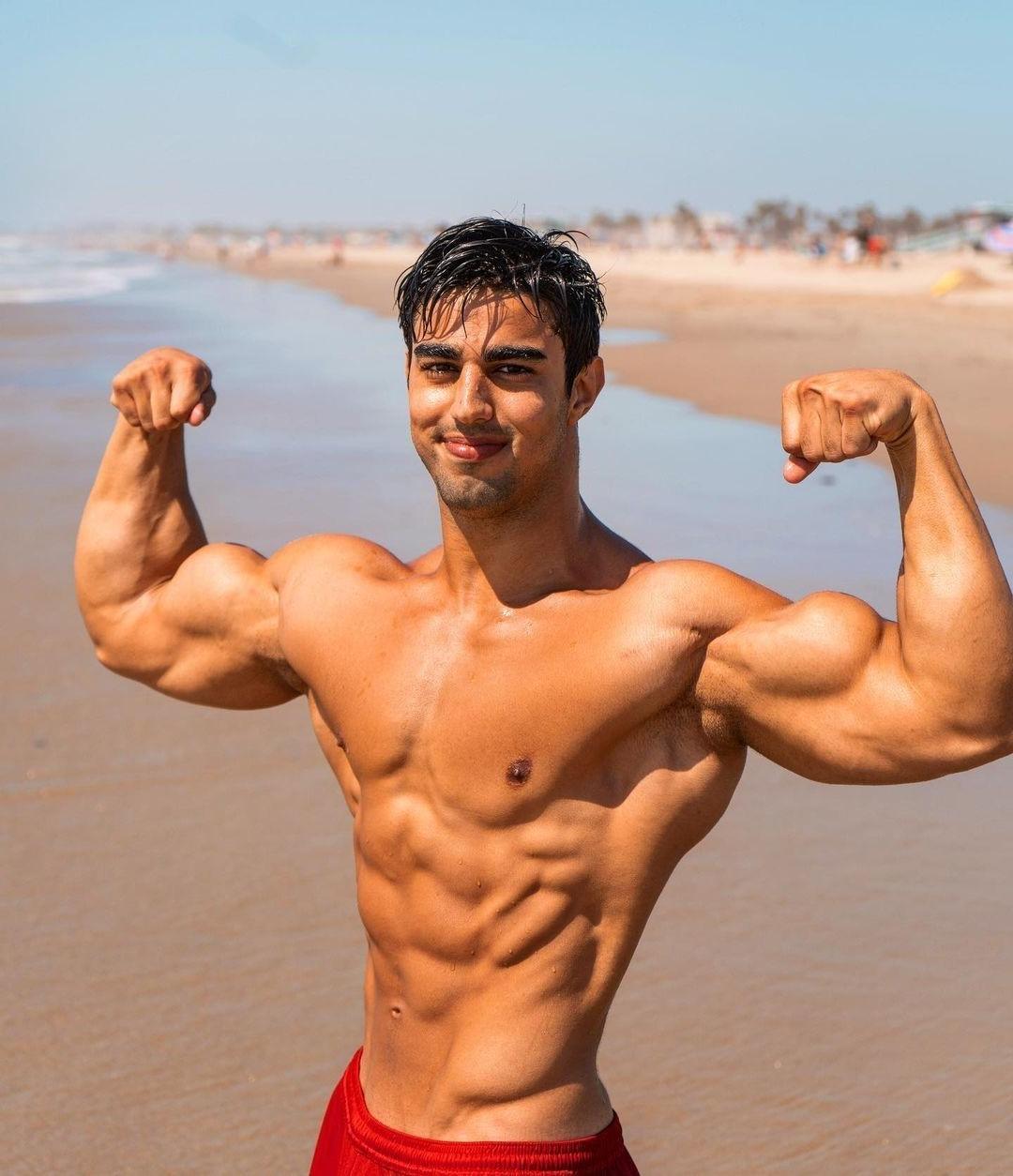 hot-tanned-beach-guys-shirtless-muscular-body-strong-huge-biceps-flex-dark-hunk