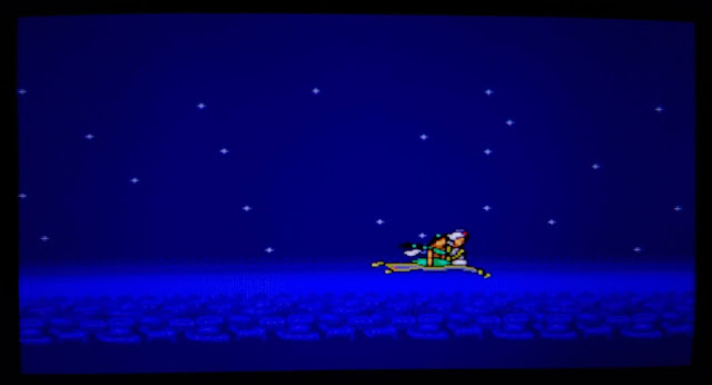 Captura de pantalla del final del videojuego de Master System Aladdin donde vemos a Jasmín y Aladdin viajar con la alfombra mágica