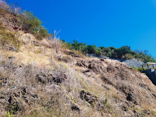 Rocky Cliffs And Dry Grassland In The Hilly Area On A Sunny Day In The Dry Season North Bali Indonesia
