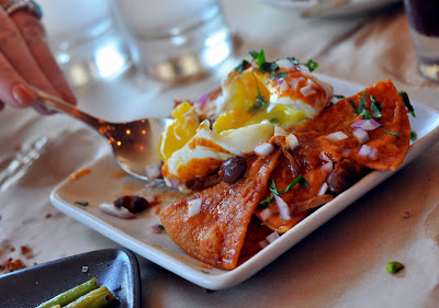 Chilaquiles with Braised Pork and Poached Egg at Zuzu in Napa, CA - Photo by Taste As You Go