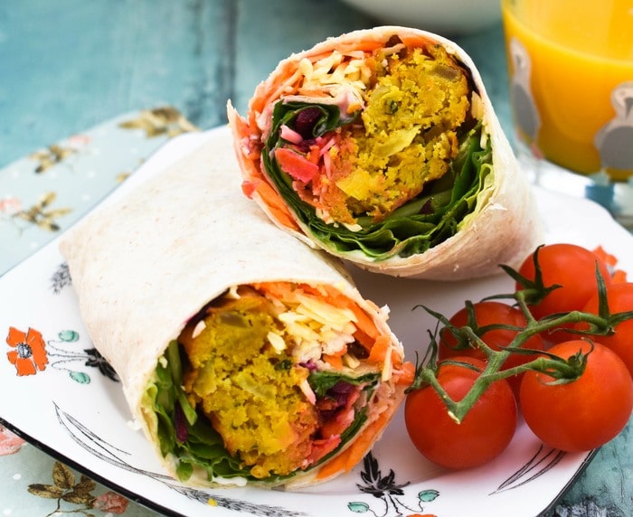 Close up of onion bhaji lunch wrap cut in half