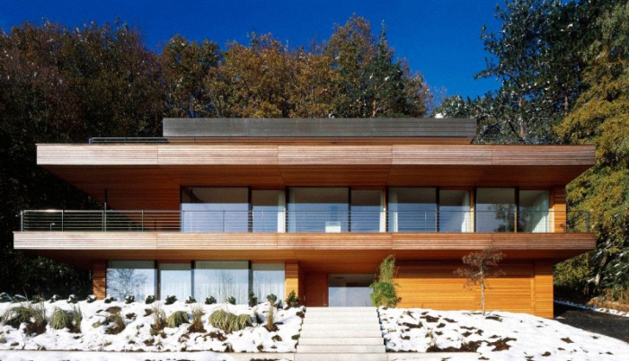 Hermosa Residencia Contemporánea Vestida en Madera y Vidrio en