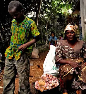 Selling meat at market in Nigeria Africa.