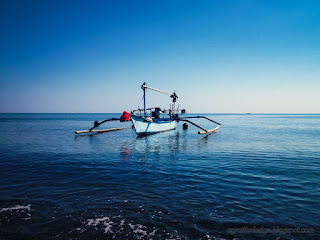 Traditional Fishing Boat View Parking On The Sea Water In The Morning Blue Sky At The Village Banjar North Bali Indonesia