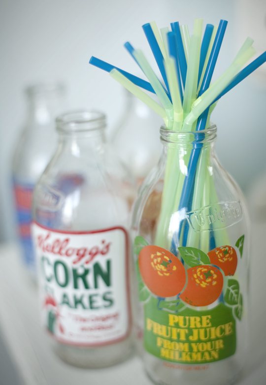 vintage milk bottles with coloured straws