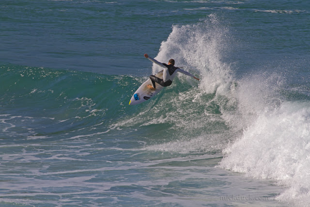 surfer surfing waves at tamarama beach sydney australia