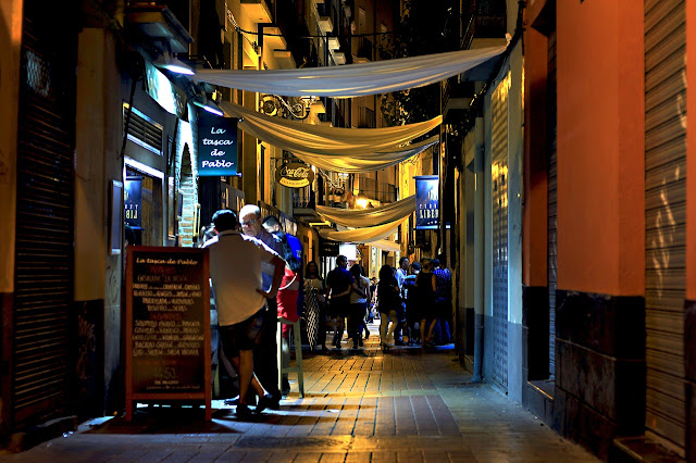 Street with bars at night