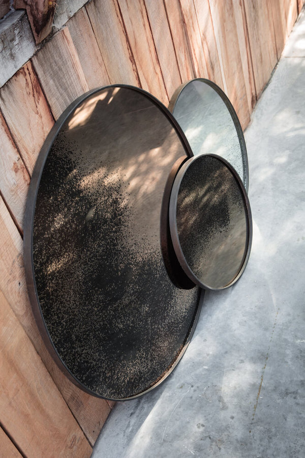 Weathered and beautiful shaped mirrors for an autumn home