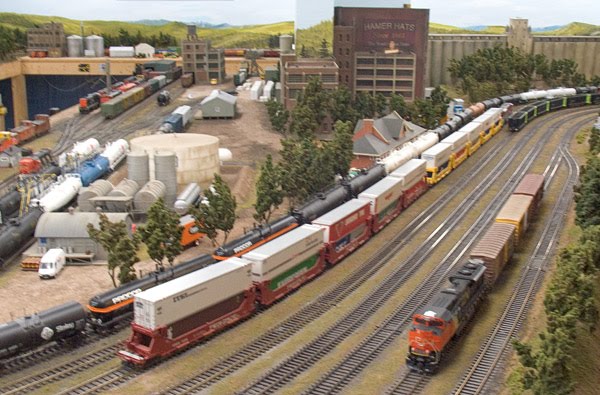  HO scale layout features unit trains, mixed freights and passenger