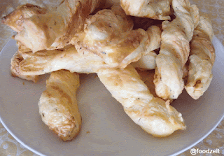 Plate of freshly baked cheese twists