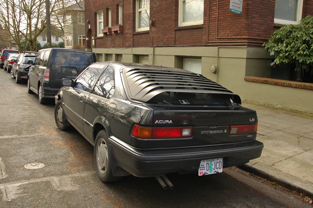 OLD PARKED CARS.: 1986 Acura Integra LS.