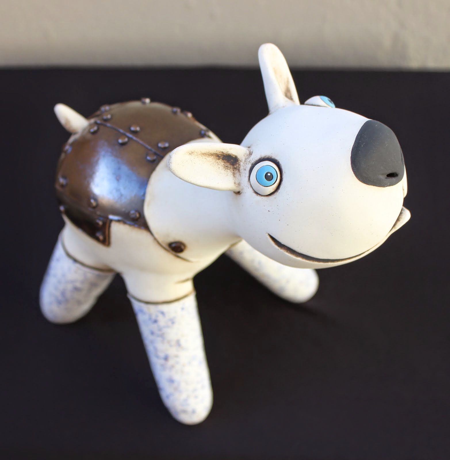 metallic dog with legwarmers