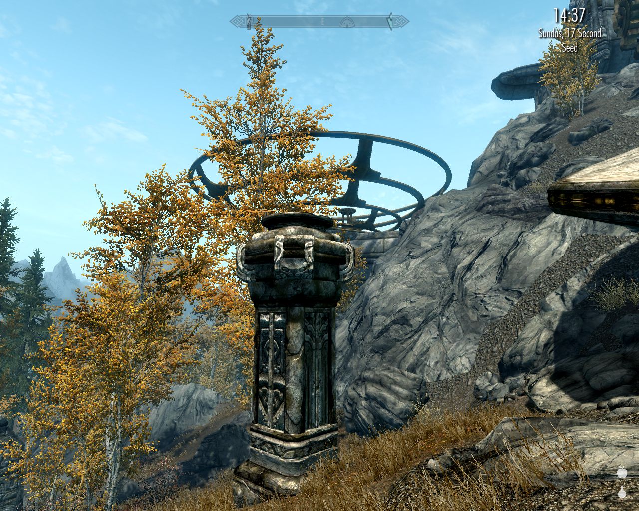 smallish Dwemer-style stone column with beautiful carvings on a steep downhill slope