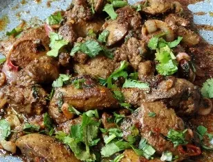garnish-the-liver-with-coriander-leaves-and-ginger