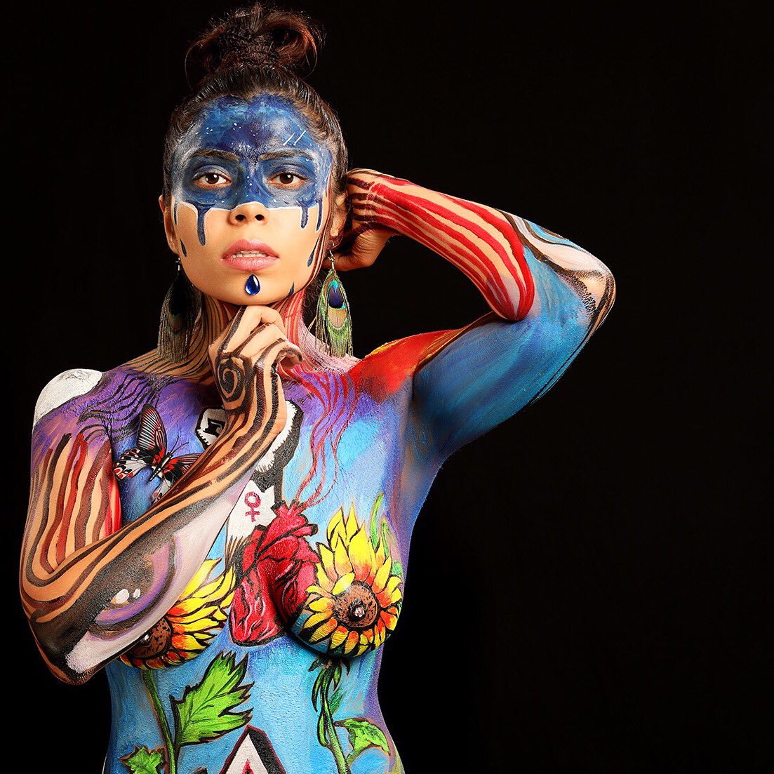 Steamy pictures of Farrah Kader in body painting.